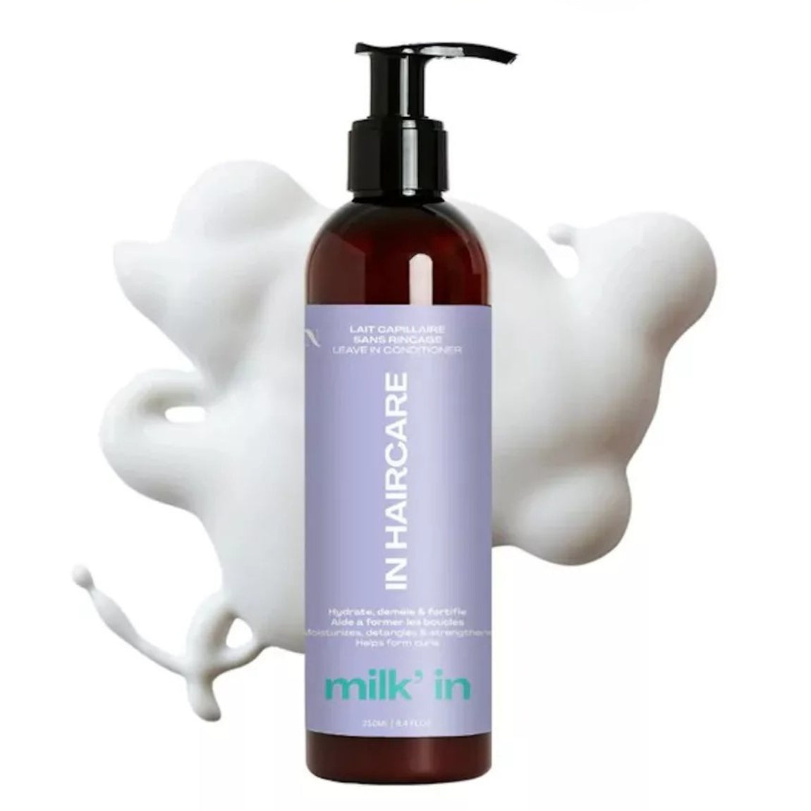 Flacon du soin capillaire leave-in Milk'In par In Haircare. Flacon blanc avec une étiquette verte. Produit pour l'hydratation et la définition des boucles.