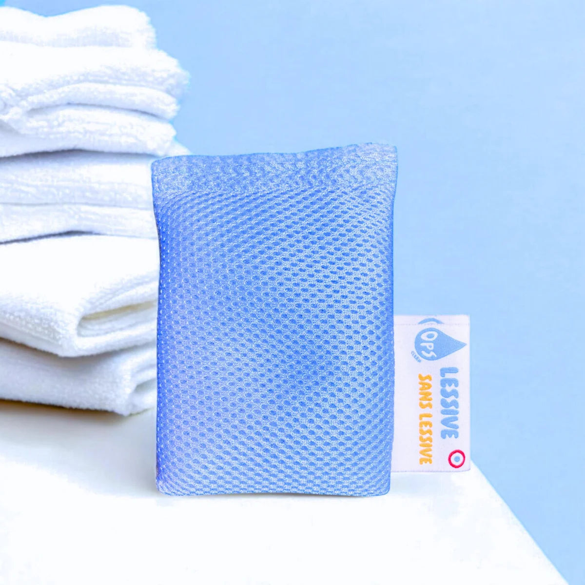 Sachet de lessive écologique Ops Clean, avec billes de magnésium pour un lavage 100% naturel.