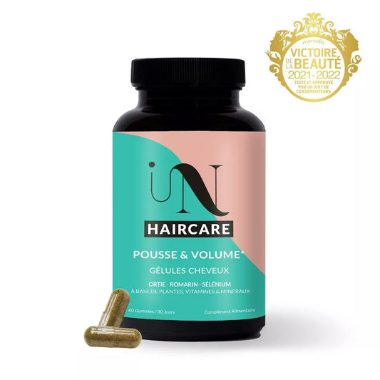 Flacon de gélules In Haircare, 100% végétales, pour la croissance et la fortification des cheveux.